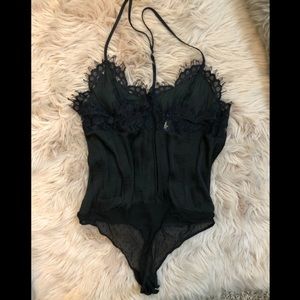 Black silky body suit with lace detail